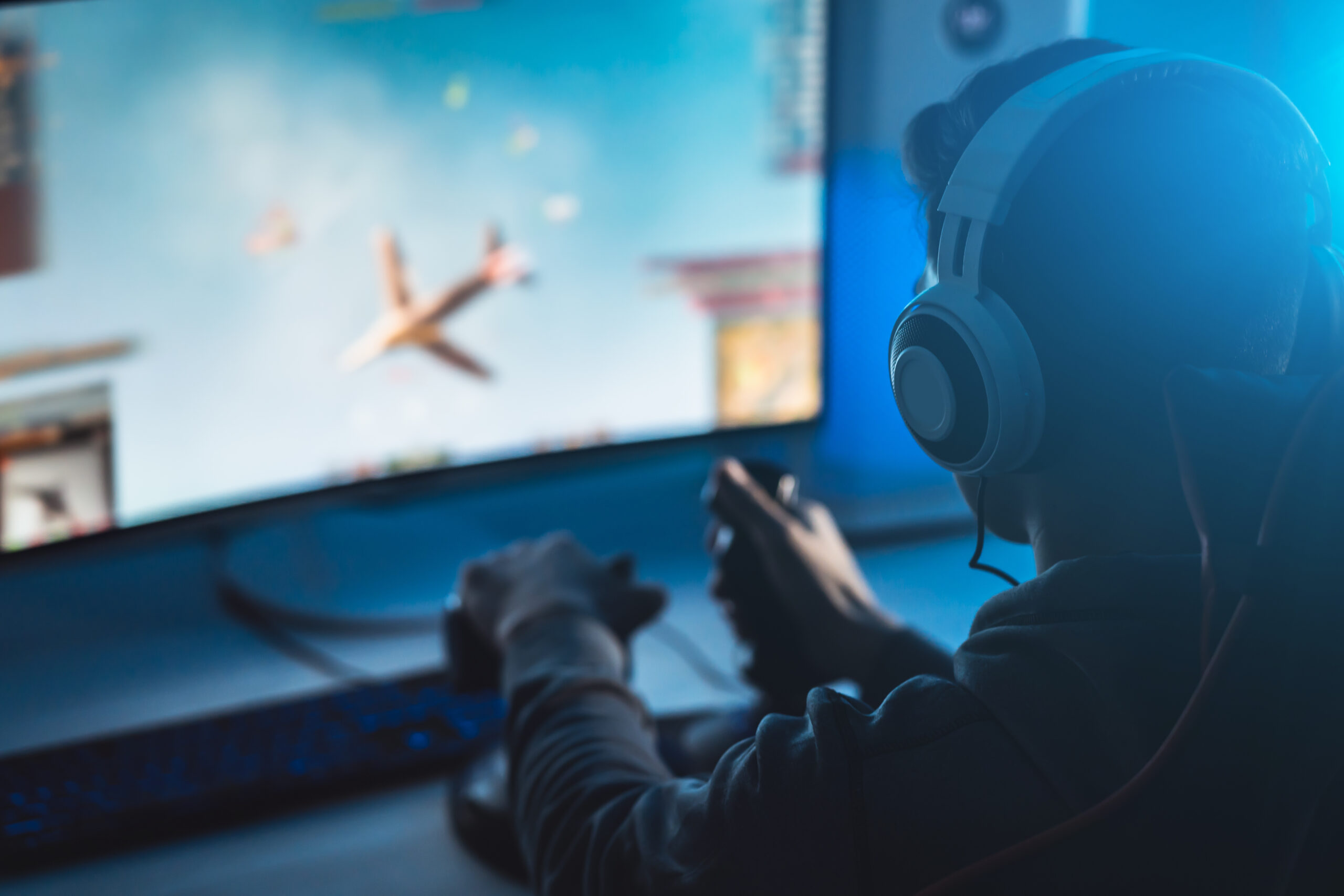 The,Guy,Gamer,With,Headset,Playing,Video,Games,On,His